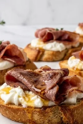Beef Prosciutto Crostini with Burrata and Lemon Honey Drizzle